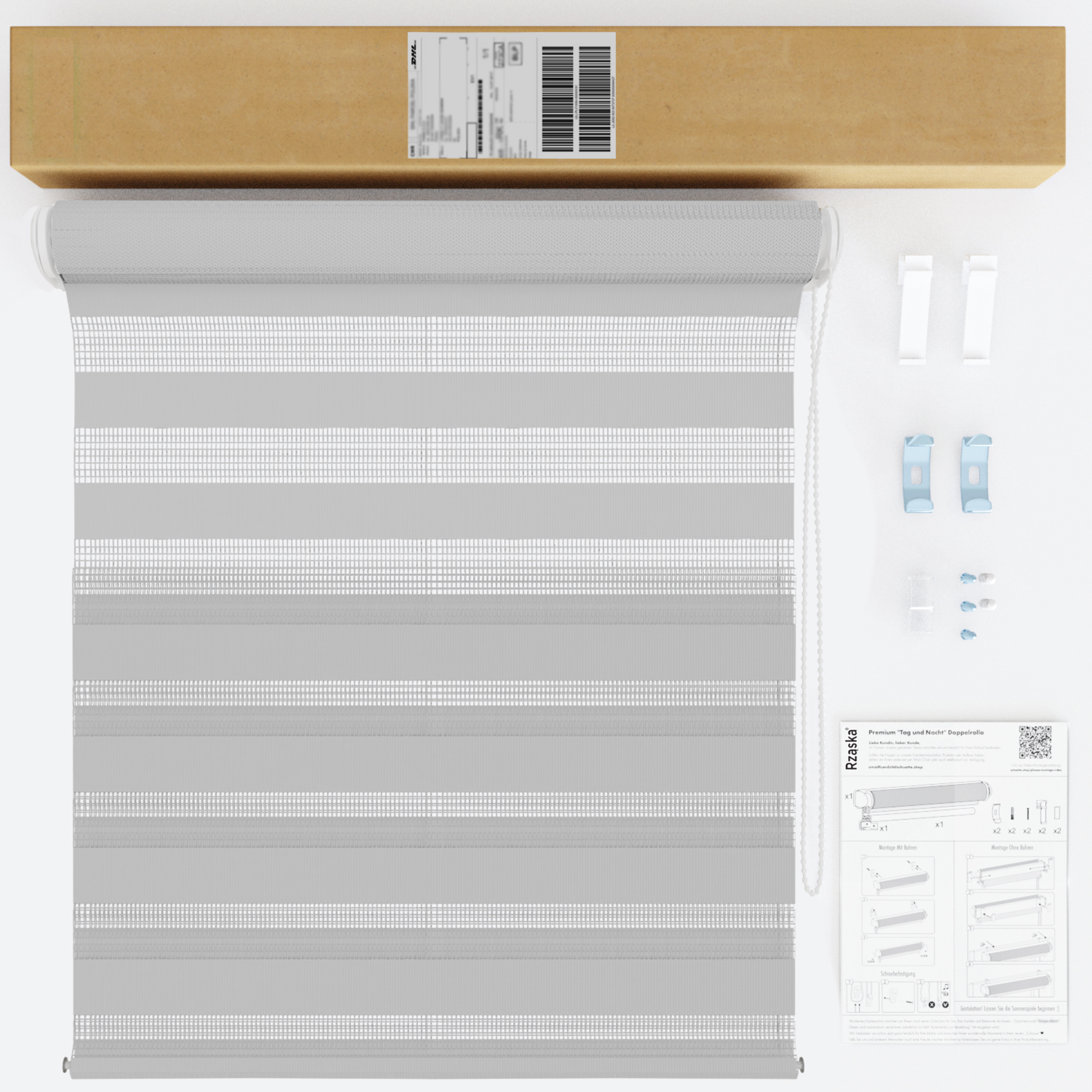 Nowoczesne rolety Rząska® na wymiar, kolekcja Dzień i Noc, uchwyty bezinwazyjne i inwazyjne 2w1 w kolorze Pochmurny dzień, szarym z profilem białym.